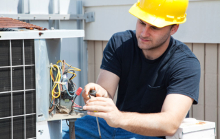 professional performing HVAC maintenance
